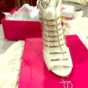 White and gold caged shoes